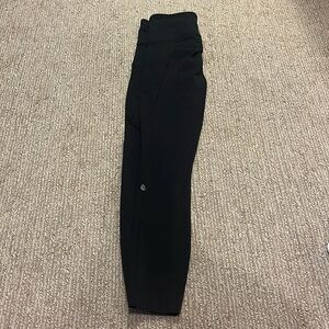 Lululemon black 28” leggings with pockets size 4